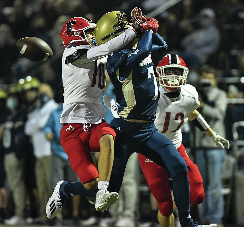 Farmington defensive back Sam Wells (10) breaks up a pass intended for Pulaski Academy quarterback Charlie Fiser (7) during Friday night's game at Joe B. Hatcher stadium in Little Rock.

Special to the Democrat-Gazette/JIMMY JONES

More photos at arkansasonline.com/1121farmpa/