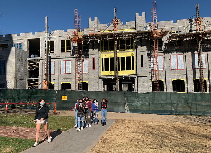 A group of visitors to the University of Arkansas campus is led on a tour Thursday, Nov. 19, 2020, as work continues on a Student Success Center on the university campus in Fayetteville. Visit nwaonline.com/201120Daily/ for today's photo gallery. 
(NWA Democrat-Gazette/Andy Shupe)