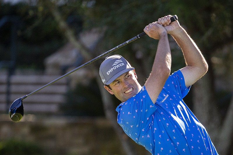 Robert Streb watches his drive down the 10th fairway during third round of the RSM Classic golf tournament, Saturday, Nov. 21, 2020, in St. Simons Island, Ga. (AP Photo/Stephen B. Morton)