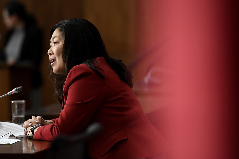 Minister of International Trade Mary Ng participates in a news conference in Ottawa, on Saturday, Nov. 21, 2020.  The U.K. signed an interim trade deal with Canada on Saturday, the second major agreement the country has reached as negotiators hurry to cement trading relationships in preparation for life outside the European Union.  (Justin Tang/The Canadian Press via AP)