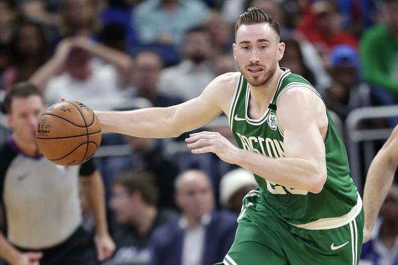 FILE - In this Jan. 24, 2020, file photo, Boston Celtics forward Gordon Hayward moves the ball on a fast break against the Orlando Magic during the second half of an NBA basketball game in Orlando, Fla. Hayward has been a player that the Charlotte Hornets have wanted for years. On Saturday, Nov. 21, 2020, they finally landed him, according to Priority Sports, the agency that represents the veteran forward. ESPN, which first reported the agreement, said Hayward would sign a four-year deal worth $120 million.  (AP Photo/John Raoux, File)