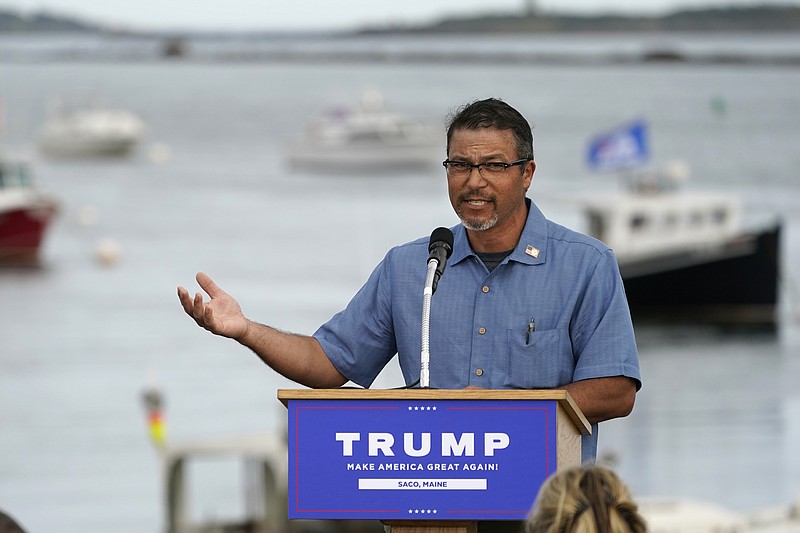 In this Sept. 17 file photo, lobsterman Jason Joyce speaks at a campaign rally for President Donald Trump at the harbor at Camp Ellis in Saco, Maine. Joyce also spoke at the Republican National Convention, touting Trump's efforts to help the state's lobster industry. - AP Photo/Robert F. Bukaty