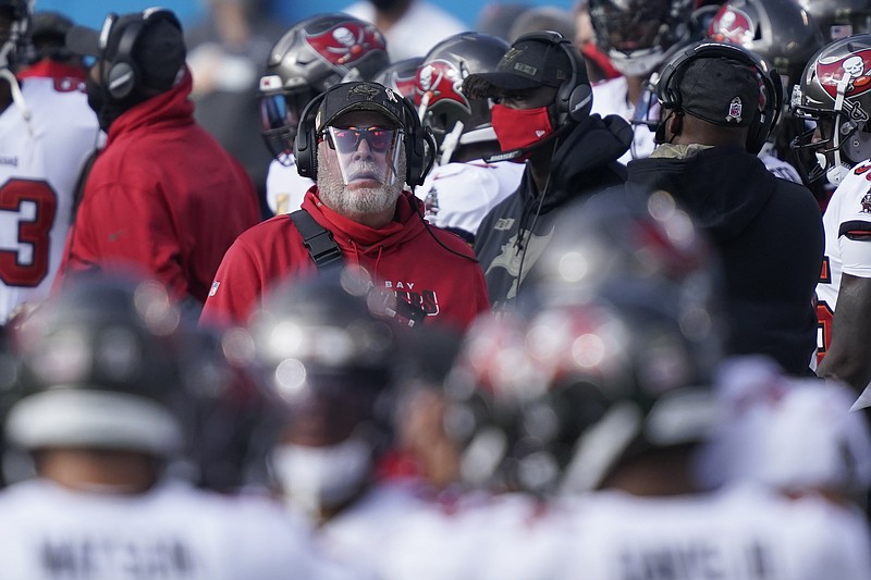 Tampa Bay Buccaneers head coach Bruce Arians walks the sidelines during the first half of an NFL football game against the Carolina Panthers, Sunday, Nov. 15, 2020, in Charlotte , N.C. (AP Photo/Gerry Broome)