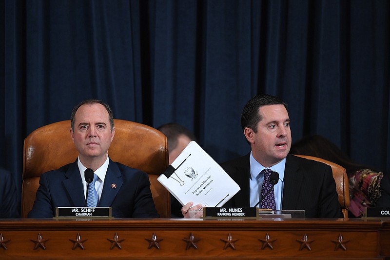 (L-r) Reps. Adam Schiff, D-Calif., and Devin Nunes, R-Calif., the House Intelligence Committee's top Democrat and Republican, respectively, oversee witness testimony during an impeachment inquiry hearing on Nov. 21, 2019. MUST CREDIT: Washington Post photo by Matt McClain