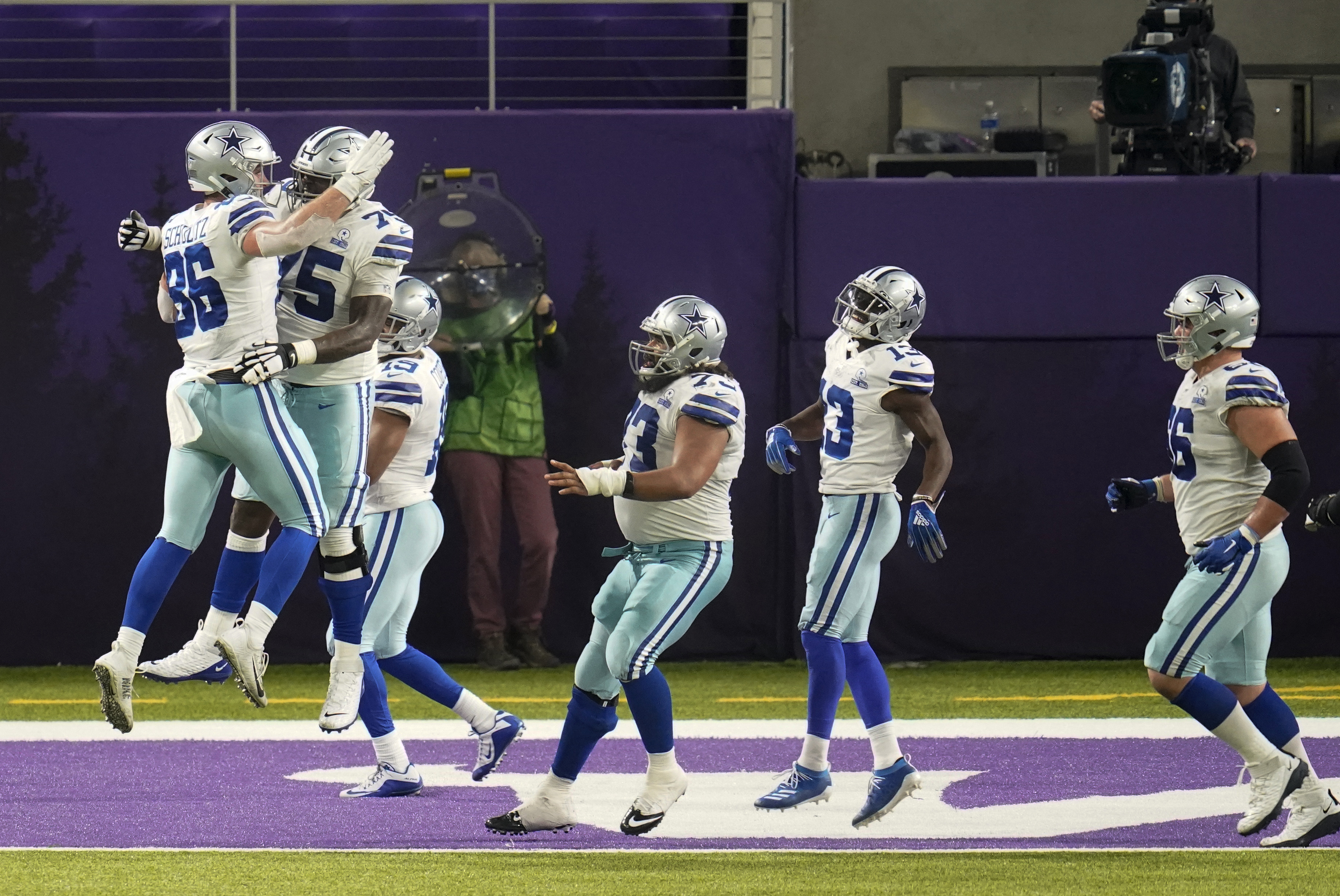 Dallas Cowboys safety Donovan Wilson (37) and linebacker Joe