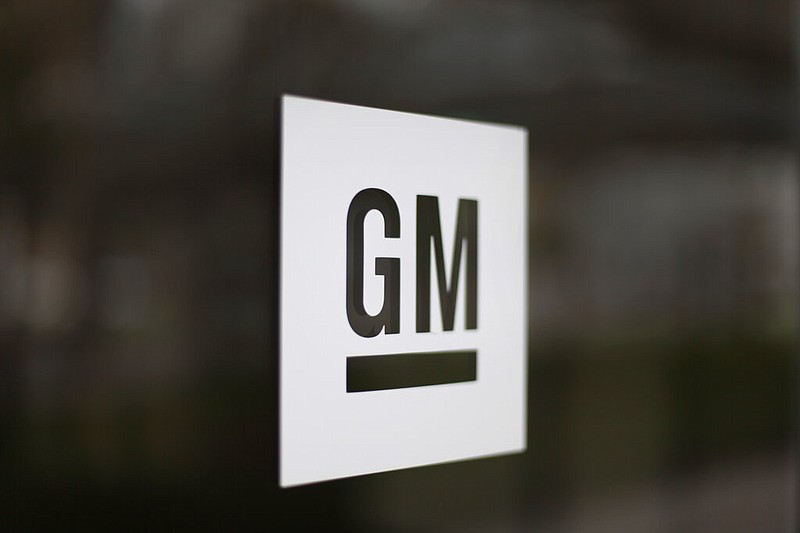 FILE - This Friday, May 16, 2014, file photo, shows the General Motors logo at the company's world headquarters in Detroit. The U.S. is making General Motors recall and repair nearly 6 million big pickup trucks and SUVs equipped with potentially dangerous Takata air bag inflators. The move announced Monday, Nov. 23, 2020, by the National Highway Traffic Safety Administration will cost the automaker an estimated $1.2 billion.   (AP Photo/Paul Sancya, File)