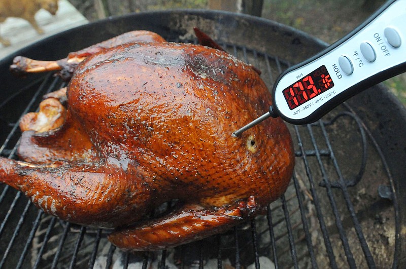 Try brining your Thanksgiving turkey to give it a moist, delicious flavor. An instant-read thermometer takes the guess work out of knowing when the turkey is done. 
(NWA Democat-Gazette/Flip Putthoff)