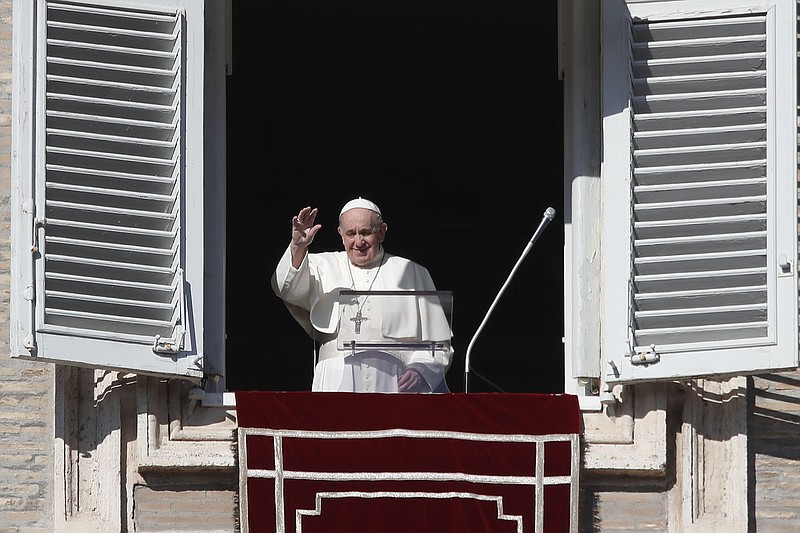 Pope Francis waves as he arrives for the Angelus noon prayer from the window of his studio overlooking St.Peter’s Square, at the Vatican, Sunday, Nov. 22, 2020.
(AP/Alessandra Tarantino) story.lead_photo.caption