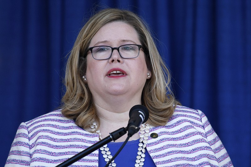 FILE - In this June 21, 2019 file photo, General Services Administration Administrator Emily Murphy speaks during a ribbon cutting ceremony for the Department of Homeland Security's St. Elizabeths Campus Center Building in Washington.   The head of the obscure federal government agency that is holding up Joe Biden's presidential transition knew well before Election Day she might have a messy situation on her hands well. Prior to Nov. 3, GSA administrator Emily Murphy held a Zoom call with Dave Barram, 77, a man who was in her shoes 20 years earlier during the contested 2000 election between George W. Bush and Al Gore. Barram said he gave her some simple advice, “If you do the right thing, then all you have to do is live with the consequences of it.’”(AP Photo/Susan Walsh)