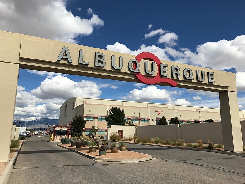 FILE - In this Oct. 8, 2018, file photo, is the entrance to ABQ Studios in Albuquerque, N.M., where Netflix announced at the studio complex that it chose Albuquerque as a new production hub. Netflix is pledging an additional $1 billion investment in its production hub in New Mexico. The company joined government officials Monday, Nov. 23, 2020, in announcing its plans. The expansion will add about 300 acres to the existing campus on the southern edge of Albuquerque, making it what officials say will be one of the largest film production facilities in North America. (AP Photo/Susan Montoya Bryan, File) story.lead_photo.caption