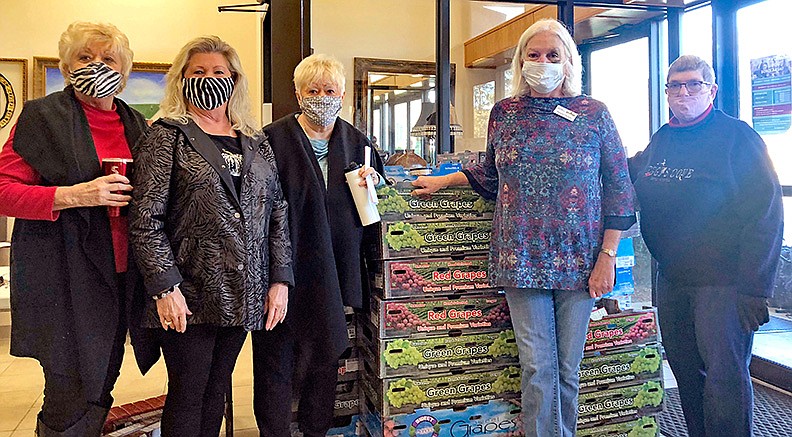 From left are Emblem members Sharyn Cole, Emblem Club No. 194 President Ginger Yates and Beverly Goodridge; Margaret Freeman, parent coordinator for the Hot Springs School District; and Emblem member Jackie Covey, who chairs this annual community service project for the club. - Submitted photo