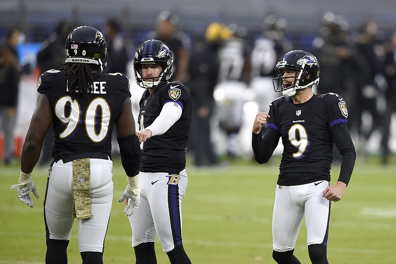 Baltimore Ravens kicker Justin Tucker reacts after kicking a field goal Sunday during the second half of an NFL game against the Tennessee Titans in Baltimore. The Titans won 30-24 in overtime. - Photo by Gail Burton of The Associated Press