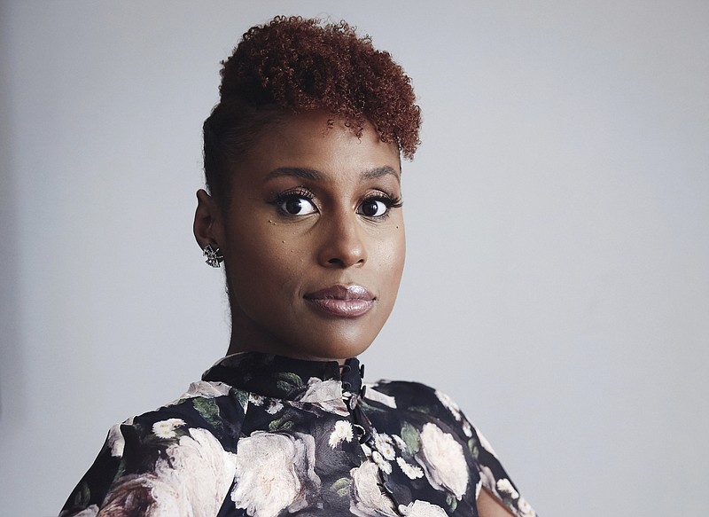 FILE - Issa Rae poses for a portrait in New York on Aug. 8, 2018. The "Insecure" star is urging people to shop locally as part of Small Business Saturday, a couple days after Thanksgiving. (Photo by Taylor Jewell/Invision/AP, File)