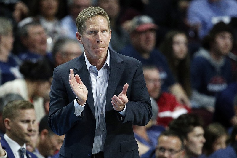 FILE - In this March 10, 2020, file photo, Gonzaga head coach Mark Few motions toward the court in the second half of an NCAA college basketball game against Saint Mary's in the final of the West Coast Conference men's tournament in Las Vegas. Gonzaga and Baylor remained Nos. 1-2 in the first Associated Press men’s college basketball poll of the regular season released Monday, Nov. 30, 2020.  (AP Photo/John Locher, File)