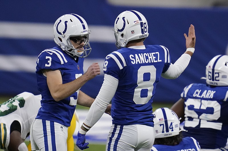 Indianapolis Colts kicker Rodrigo Blankenship (3) celebrates kicking a field goal with Rigoberto Sanchez (8) during the second half of an NFL football game against the Green Bay Packers, Sunday, Nov. 22, 2020, in Indianapolis. (AP Photo/Michael Conroy)