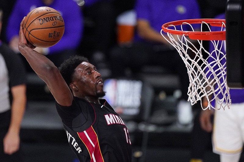 Miami Heat's Bam Adebayo (13) dunks on Oct. 11 during the second half in Game 6 of the NBA Finals against the Los Angeles Lakers in Lake Buena Vista, Fla. - Photo by Mark J. Terrill of The Associated Press