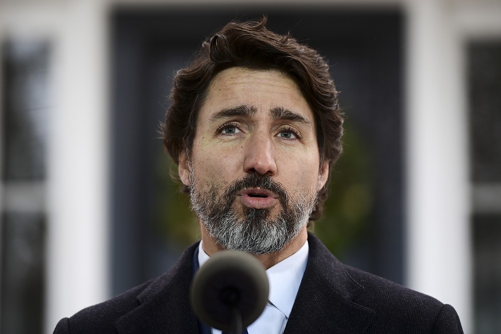 Prime Minister Justin Trudeau holds a press conference at Rideau Cottage during the COVID pandemic in Ottawa on Tuesday, Dec. 1, 2020. (Sean Kilpatrick/The Canadian Press via AP)
