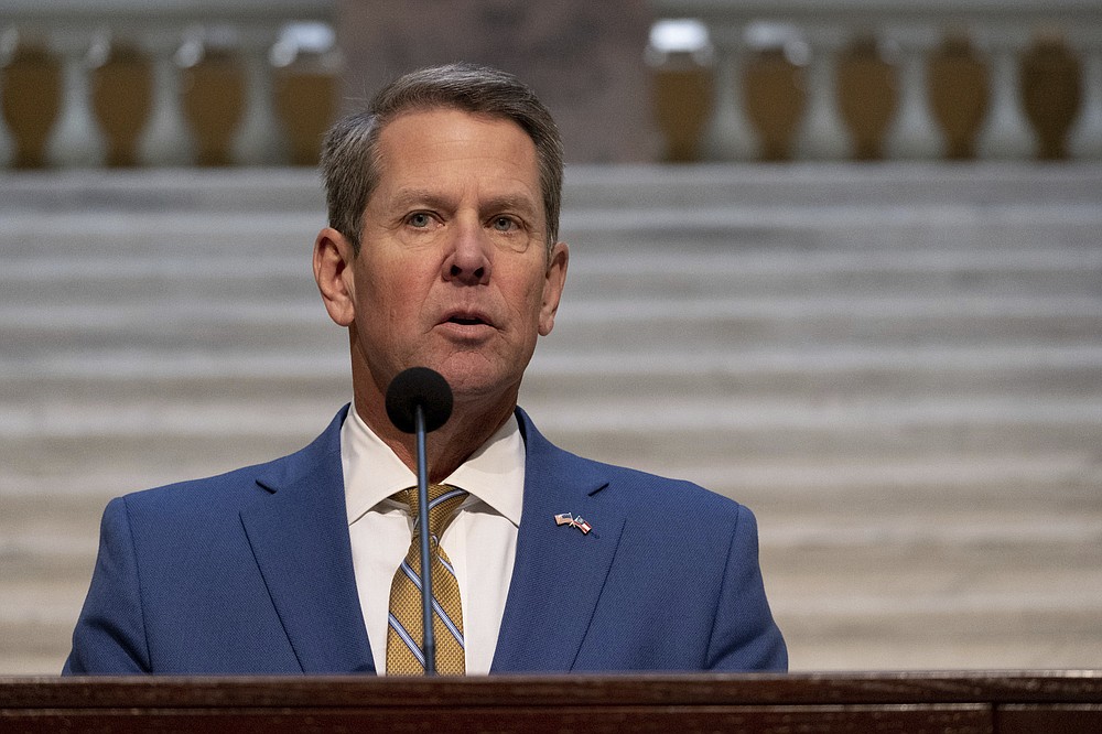 Brian Kemp holds a news conference on the current state of COVID-19, Tuesday, Nov. 24, 2020 at the Georgia State Capitol in Atlanta.  (Ben Gray /Atlanta Journal-Constitution via AP)
