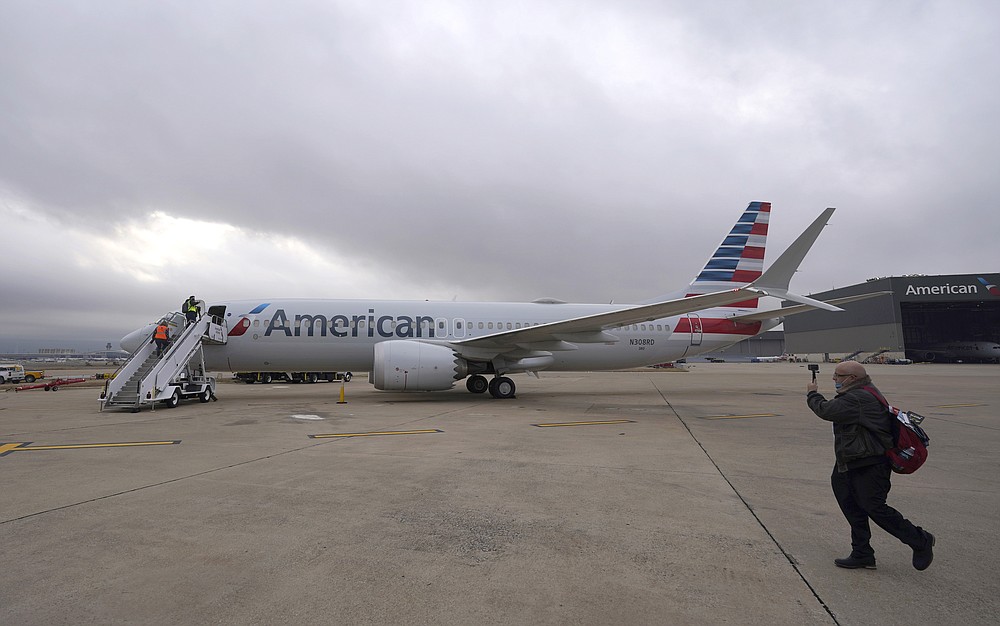 An American Airlines Boeing 737 Max jet is ready to fly from Dallas Fort Worth Airport in Grapevine, Texas, on Wednesday, December 2, 2020. American Airlines took its long-ground Boeing 737 Max jets out of storage and updated key flight control software and to fly the aircraft ahead of the first paying passenger flights later this month.  (AP Photo / LM Otero)