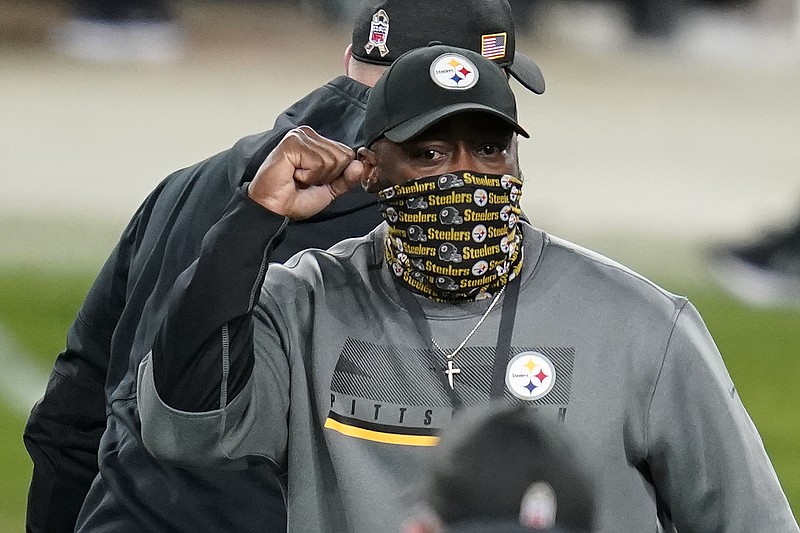 Pittsburgh Steelers head coach Mike Tomlin celebrates as he walks off the field following a win over the Cincinnati Bengals during an NFL football game, Sunday, Nov. 15, 2020, in Pittsburgh. (AP Photo/Keith Srakocic)
