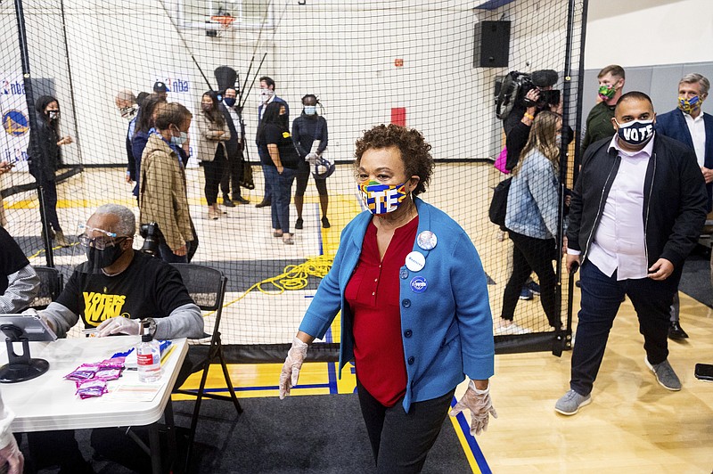 Rep. Barbara Lee, D-Calif., visits a polling location at the Golden State Warriors training facility on Tuesday, Nov. 3, 2020, in Oakland, Calif. (AP Photo/Noah Berger)