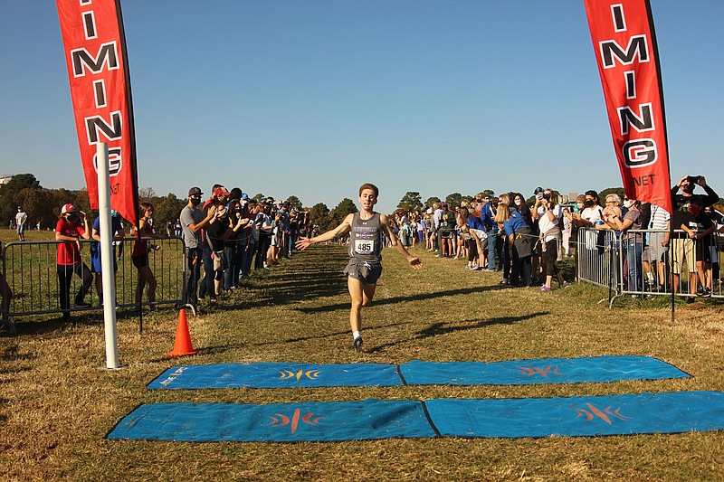 Fayetteville senior Jack Williams, shown crossing the finish line to win the Class 6A state cross country meet, has been named the all-NWADG boys cross country runner of the year.