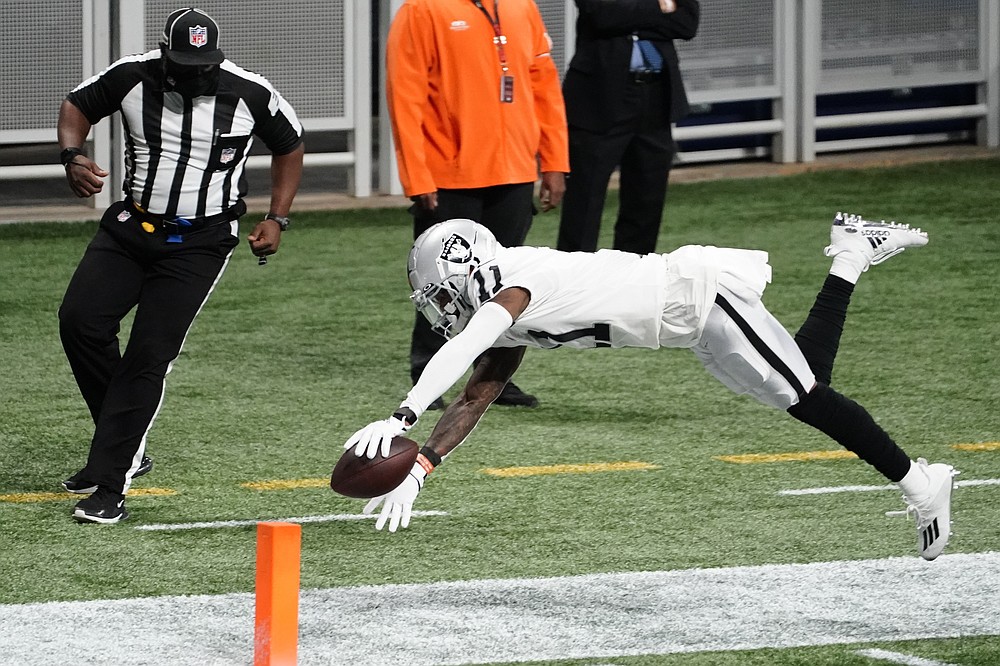 East Rutherford, New Jersey, USA. 6th Dec, 2020. Las Vegas Raiders wide  receiver Henry Ruggs III (11) reacts to the touchdown with wide receiver Hunter  Renfrow (13) during the NFL game between