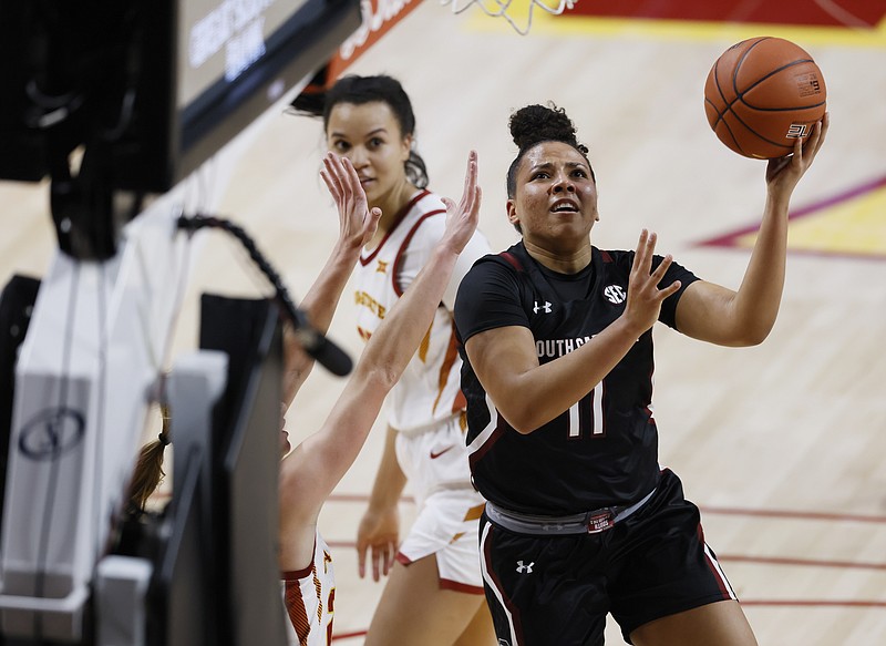 South Carolina guard Destiny Littleton finds a shot around Iowa State's defense during the first half of an NCAA college basketball game, Sunday, Dec. 6, 2020, in Ames, Iowa. (AP Photo/ Matthew Putney)