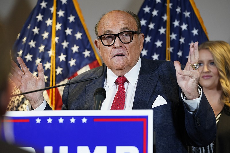 FILE - In this Nov. 19, 2020, file photo, former New York Mayor Rudy Giuliani, a lawyer for President Donald Trump, speaks during a news conference at the Republican National Committee headquarters, in Washington. (AP Photo/Jacquelyn Martin, File)