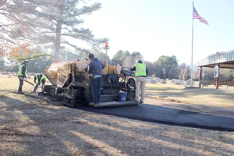 LYNN KUTTER ENTERPRISE-LEADER
Tomlinson Asphalt last week paved the gravel streets inside Farmington Cemetery. The project was the result of a fundraising campaign initiated by Mayor Ernie Penn to benefit the non-profit Farmington Cemetery Association.
