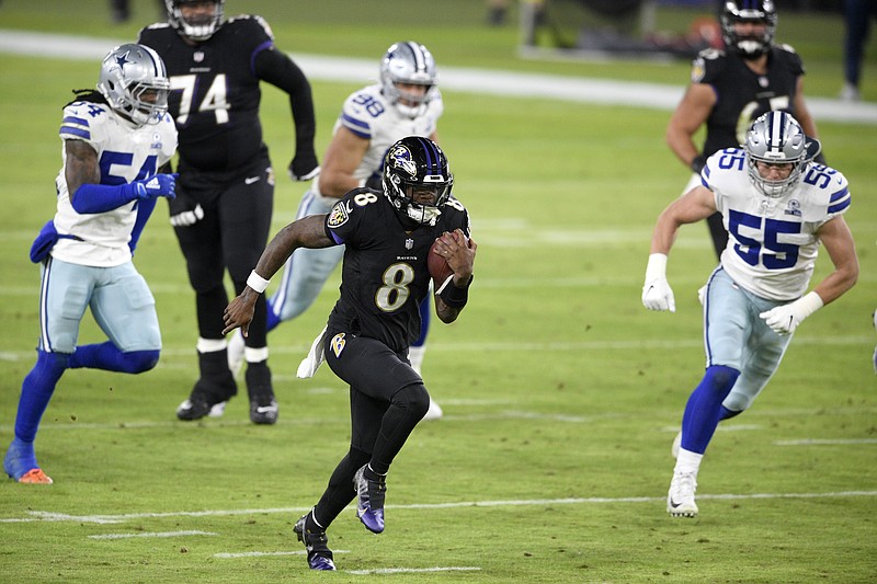 Baltimore Ravens quarterback Lamar Jackson (8) throws the ball