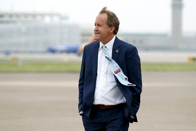  In this June 28, 2020 file photo, Texas' Attorney General Ken Paxton waits on the flight line for the arrival of Vice President Mike Pence at Love Field in Dallas.
(AP Photo/Tony Gutierrez File)