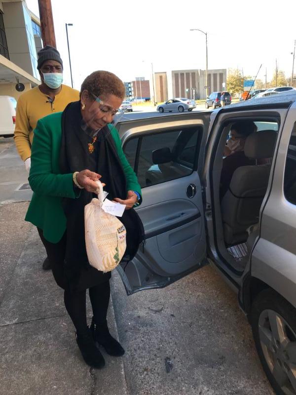 Church, mayor assist 400 families with food