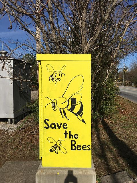 Friends Kelly Magoulick and Mollie Nichols teamed up to repaint a utility box at the corner of Gregg and Sycamore streets in Fayetteville. The images include native plants, Monarch butterflies, an admonishment to “Save The Bees,” and a Banksy-style little girl proclaiming, “There Is Always Hope.” (Courtesy Photos/Kelly Magoulick)