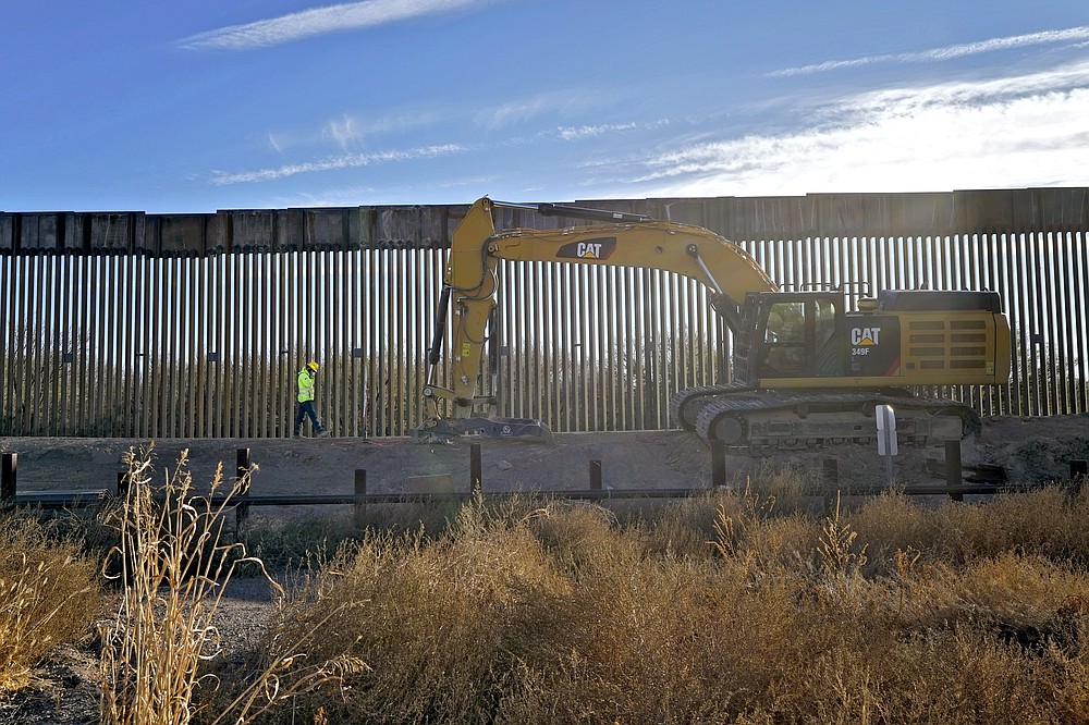 Damage from border wall blownup mountains, toppled cactus