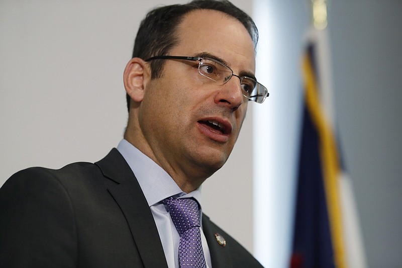 In this Oct. 7, 2019, file photo, Colorado Attorney General Phil Weiser speaks during a news conference in Denver. A group of 35 states as well as the District of Columbia and the territories of Guam and Puerto Rico filed an anti-trust lawsuit against Google on Thursday, Dec. 17, 2020, alleging that the search giant has an illegal monopoly over the online search market that hurts consumers and advertisers. The lawsuit, announced by Weiser, was filed in federal court in Washington, D.C. by states represented by bipartisan attorneys general. (AP Photo/David Zalubowski, File)