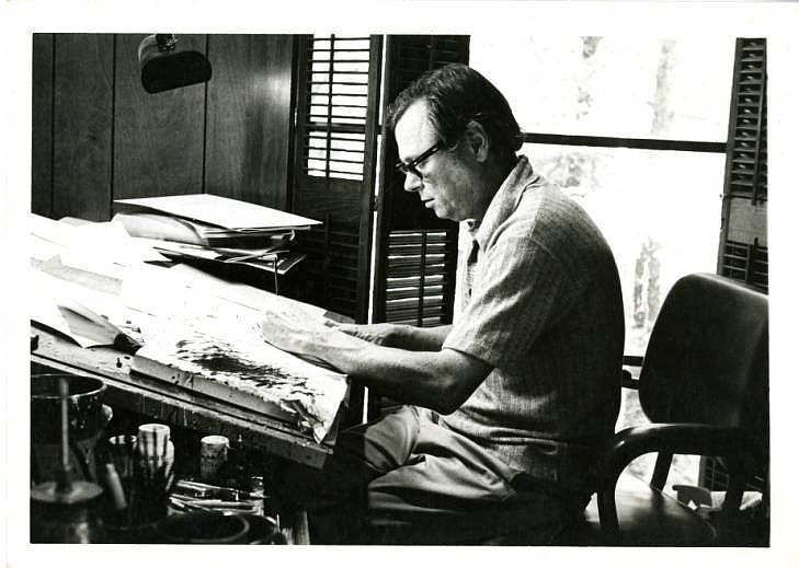 A file photo shows Arkansas political cartoonist George Fisher at work. (Special to The Commercial)