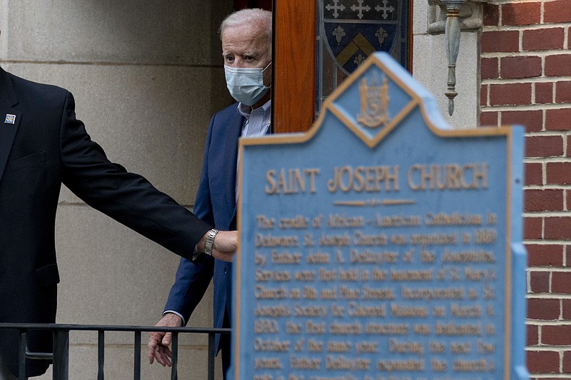 In this Oct. 3 file photo Democratic presidential candidate former Vice President Joe Biden leaves St. Joseph Catholic Church in Wilmington, Del. A Biden transition team official refused to say which church Biden might attend in the nation's capital or whether he might return to Delaware for services, at least to start. - AP Photo/Andrew Harnik, File