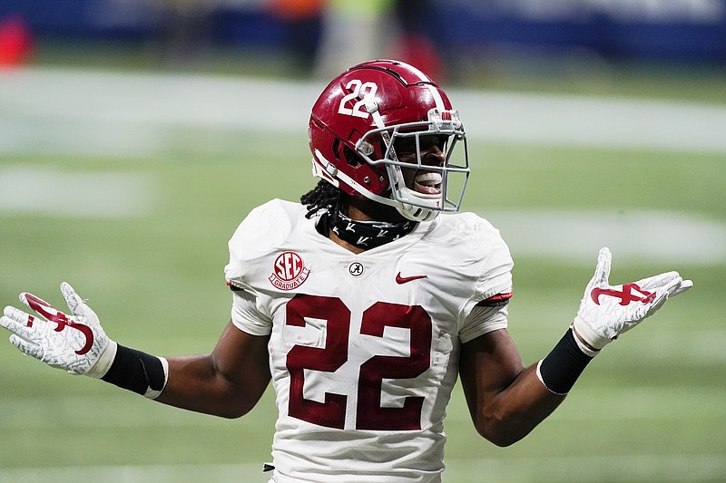 Alabama running back Najee Harris (22) reacts to his touchdown against Florida during the first half of the Southeastern Conference championship NCAA college football game, Saturday, Dec. 19, 2020, in Atlanta. (AP Photo/John Bazemore)