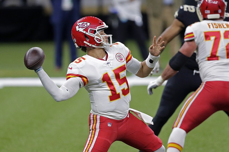 Kansas City Chiefs quarterback Patrick Mahomes (15) passes in the first half of an NFL football game against the New Orleans Saints in New Orleans, Sunday, Dec. 20, 2020. (AP Photo/Brett Duke)