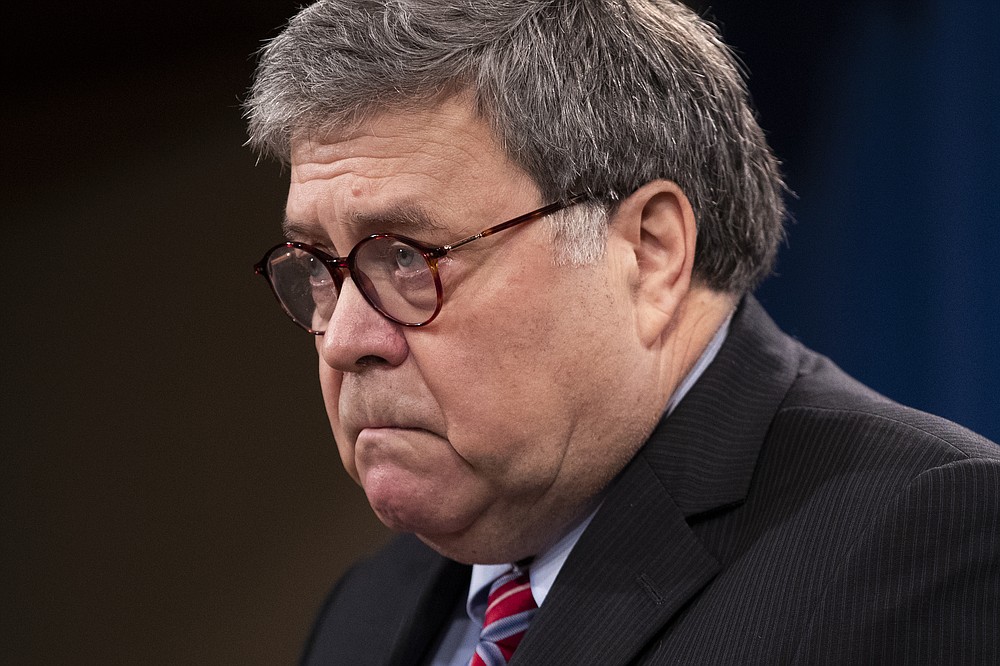Attorney General William Barr speaks during a news conference, Monday, Dec. 21, 2020 at the Justice Department in Washington. (Michael Reynolds/Pool via AP)