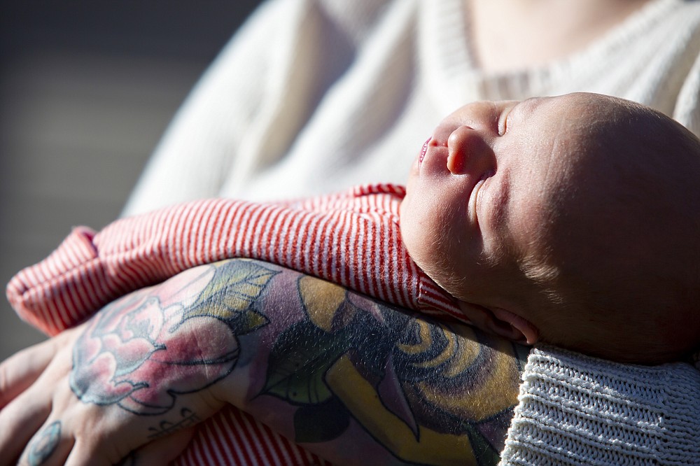 Katy Dobson imagines how she will someday explain to her son the odd early days of his life. MUST CREDIT: Photo by Meggan Haller for The Washington Post.