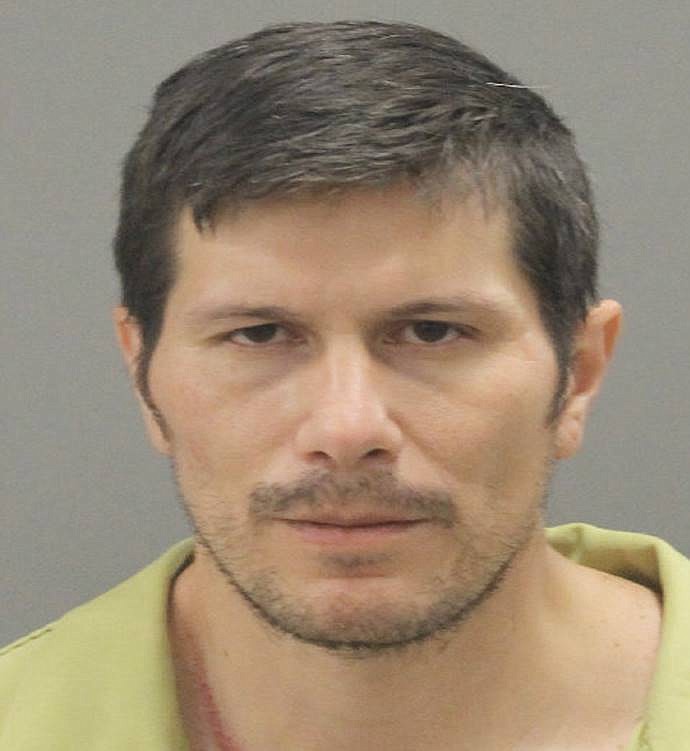 This booking photo provided by Winnebago County Sheriff's Office shows Duke Webb.  Authorities say Webb, a U.S. serviceman from Florida has been charged in the deaths of three people and the wounding of three more in a shooting at an Illinois bowling alley on Saturday, Dec. 26, 2020. Winnebago County State’s Attorney J. Hanley said Sunday that Webb has been charged with three counts of murder and three counts of first-degree attempted murder in the shooting at Don Carter Lanes, in Rockford, Ill.  (Winnebago County Sheriff's Office via AP)