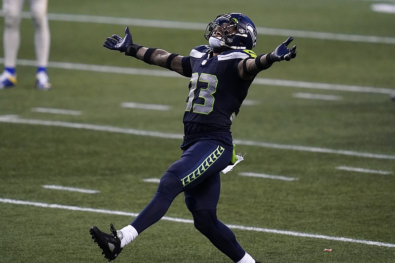 Seattle Seahawks linebacker K.J. Wright walks on the field Tuesday