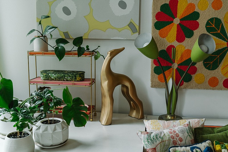Some of the canine-themed, retro decor in Liz Chai's home. (The New York Times/Nils Ericson) story.lead_photo.caption