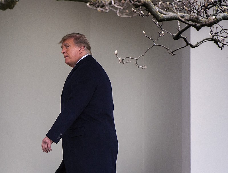 President Donald Trump walks to the Oval Office on Thursday, Dec. 31, 2020. MUST CREDIT: Washington Post photo by Bill O'Leary