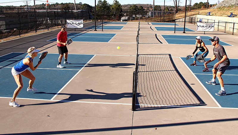 All eyes are on a return shot hit by Mandy Ballard, Team Vulcan Ambassador, at the Vulcan Pickleball Park in Hot Springs. (Special to the Democrat-Gazette/Nancy Raney and Bob Robinson)