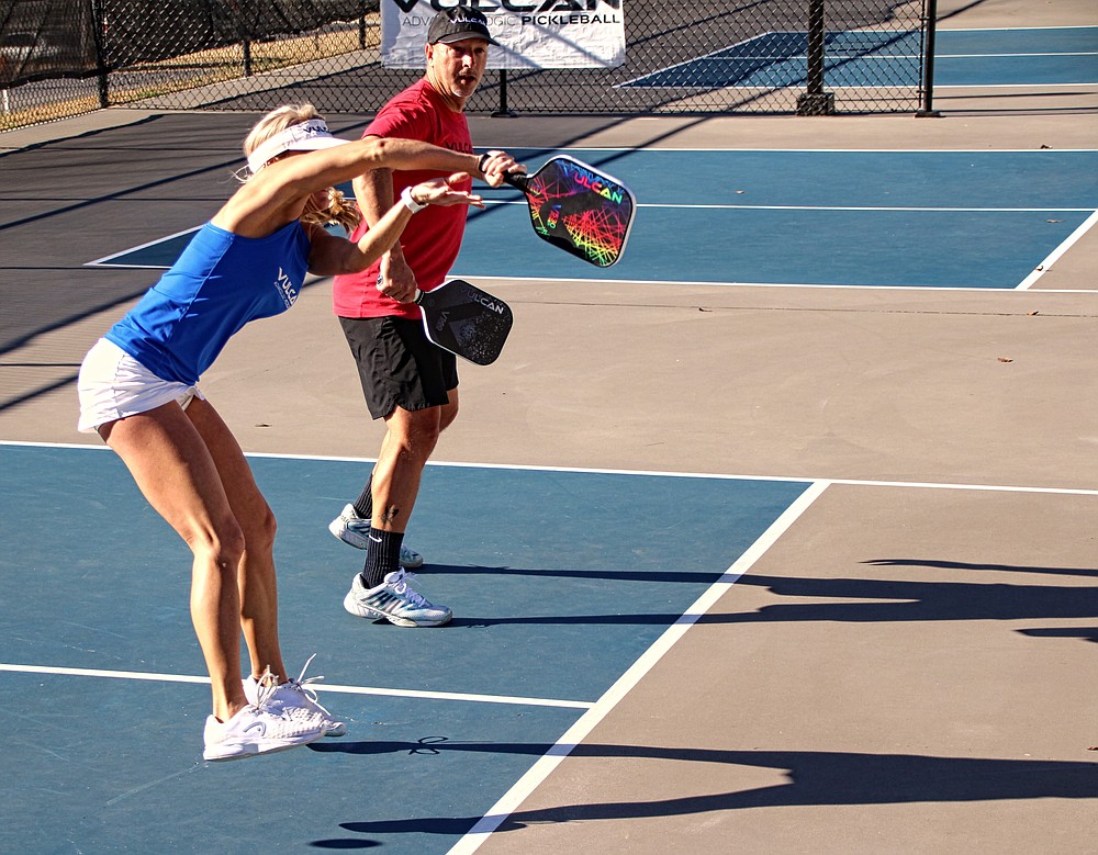 Pickleball can be played at sedate or highly athletic levels. Here Mandy Ballard shows the more athletic side at the Vulcan Pickleball Park in Hot Springs. (Special to the Democrat-Gazette/Nancy Raney and Bob Robinson)
