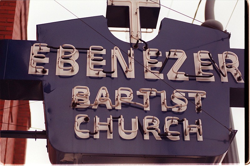This sign hangs outside the old Ebenezer Baptist Church in Atlanta, Georgia. Martin Luther King, Jr.'s father served as its pastor. It is now open daily to the public as part of The King Center.
( CARLTON WINFREY/DETROIT FREE PRESS)