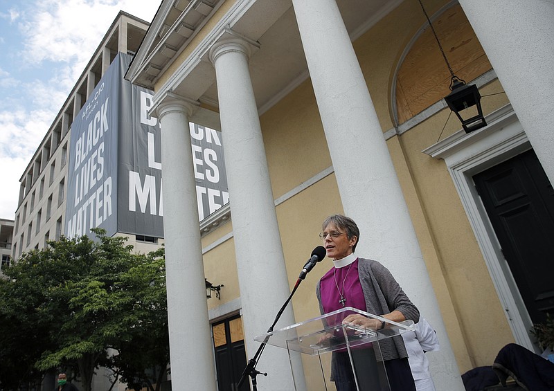 FILE - In this June 19, 2020 file photo, Rev. Mariann Budde, bishop of Washington’s Episcopal diocese, speaks during a service outside St. John's Episcopal Church near the White House in Washington. Budde is among more than 2,000 faith leaders and faith-based activists who signed a statement that is set to be released Monday, Jan. 4, 2021, urging members of Congress “to honor” the result of November’s election by avoiding “a delayed and drawn out objection” on Wednesday, Jan. 6 when President-elect Joe Biden’s win is set to be certified. (AP Photo/Carolyn Kaster, File) story.lead_photo.caption
